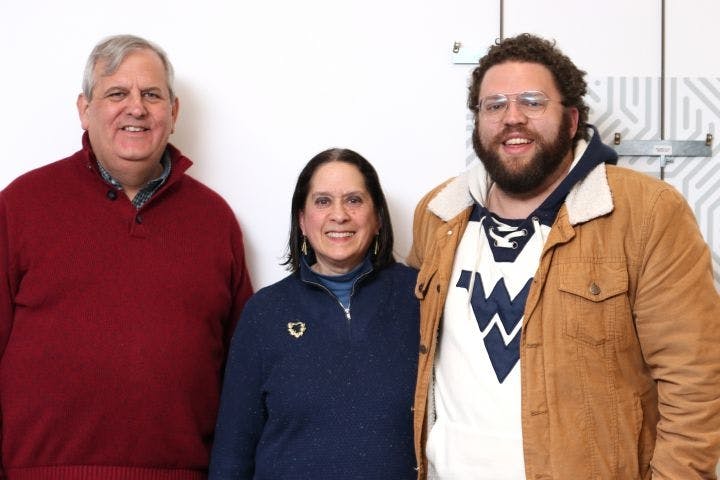 A Cyber CEO Brian Hayden, author Lee Goldman Kikel, and her son Jason stand side-by-side