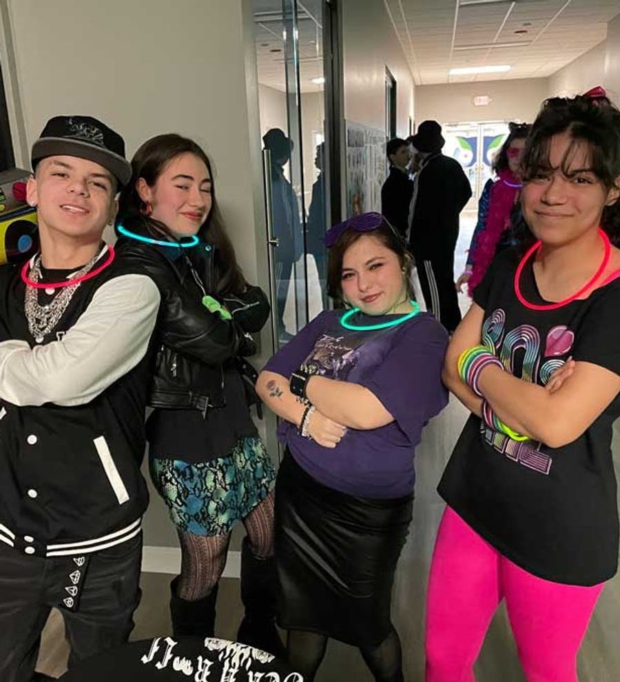 Students dress for an 90s themed dance